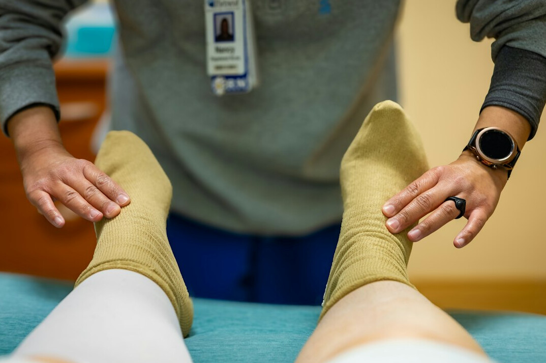 physiotherapist with patient